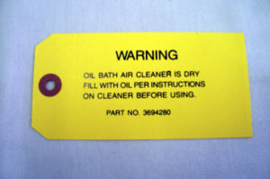 1950-57 Chevrolet Oil bath air cleaner warning tag Photo Main